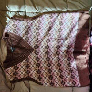 cream, pink, and brown sweater vest